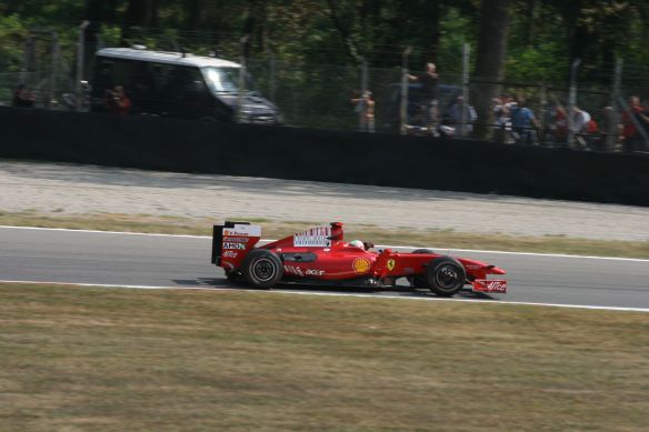 Ferrari driver Giancarlo Fisichella races around the Monza track.